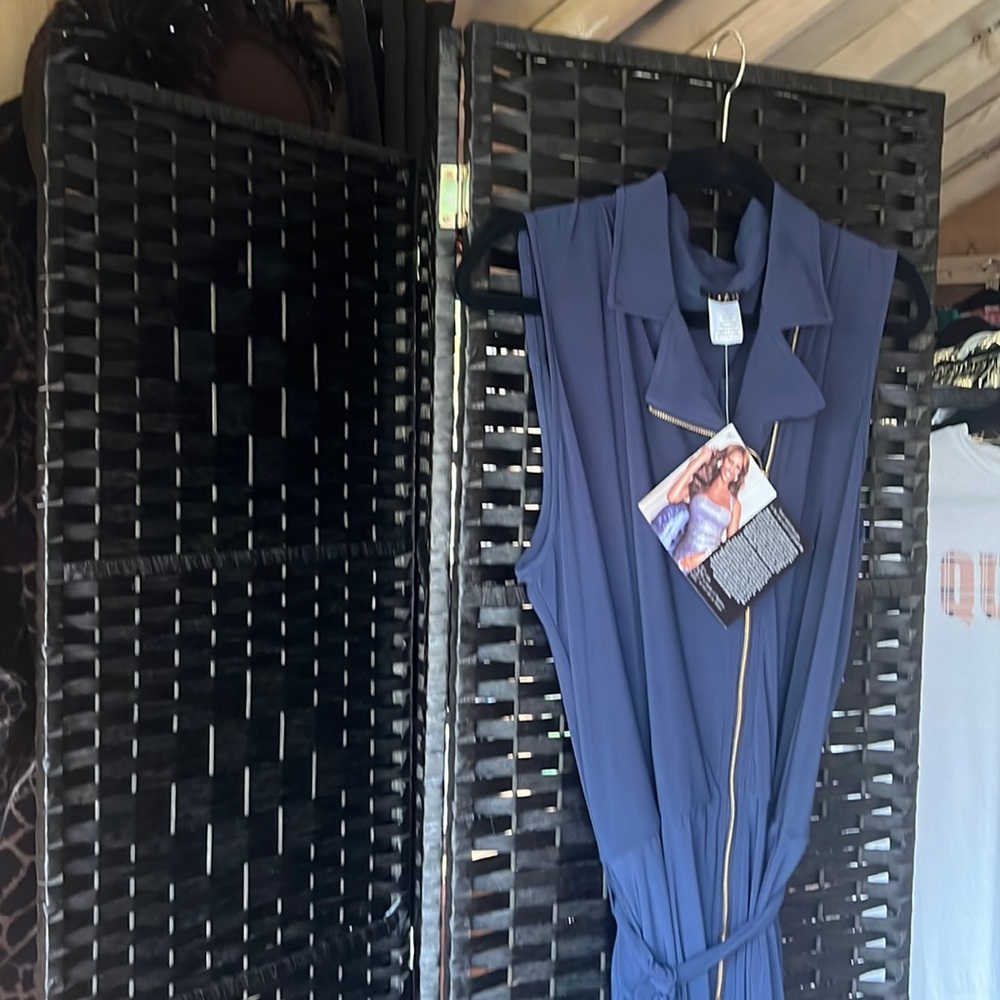 Bad navy jumpsuit by IMAN you must buy to appreciate !!